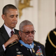 President Barack Obama presents the Medal of Honor to U.S. Army Staff Sgt. (Ret.) Melvin Morris, a Vietnam War veteran, during a ceremony in the White House.
Joe Raedle/Getty Images